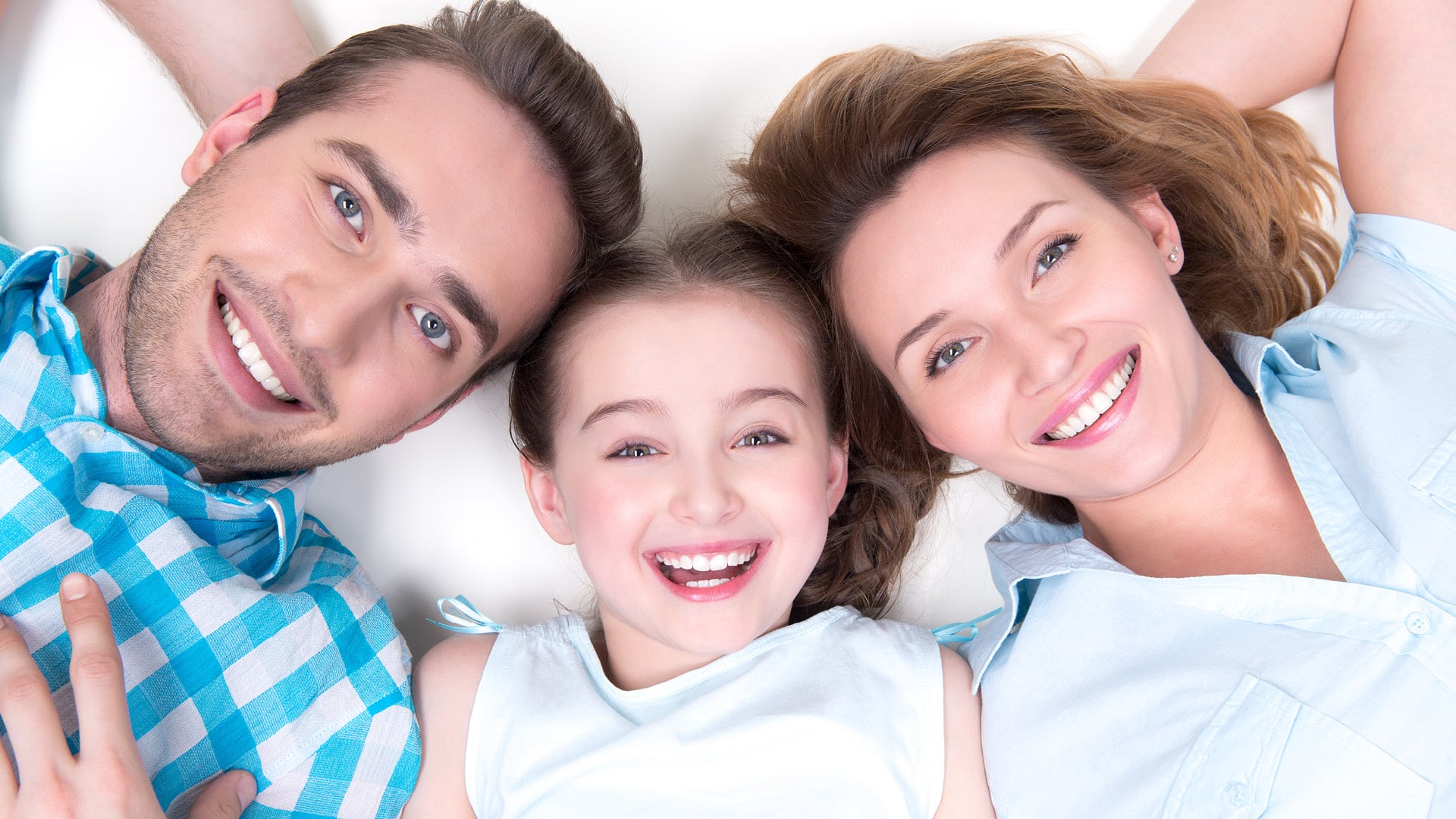 Young Family with Daughter Smiling